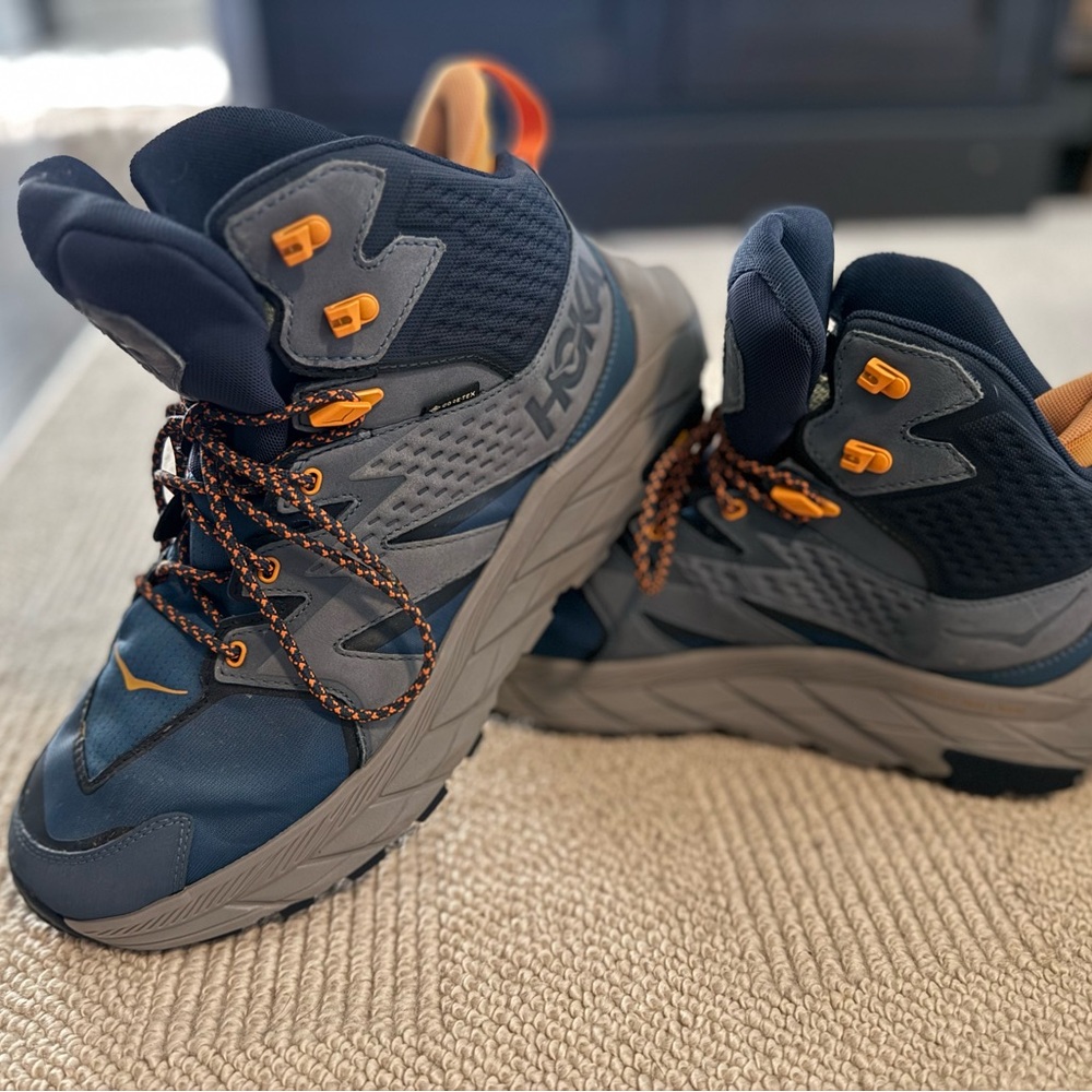 Hoka Navy and Charcoal hiking boots with Orange Accents (new without tags)
